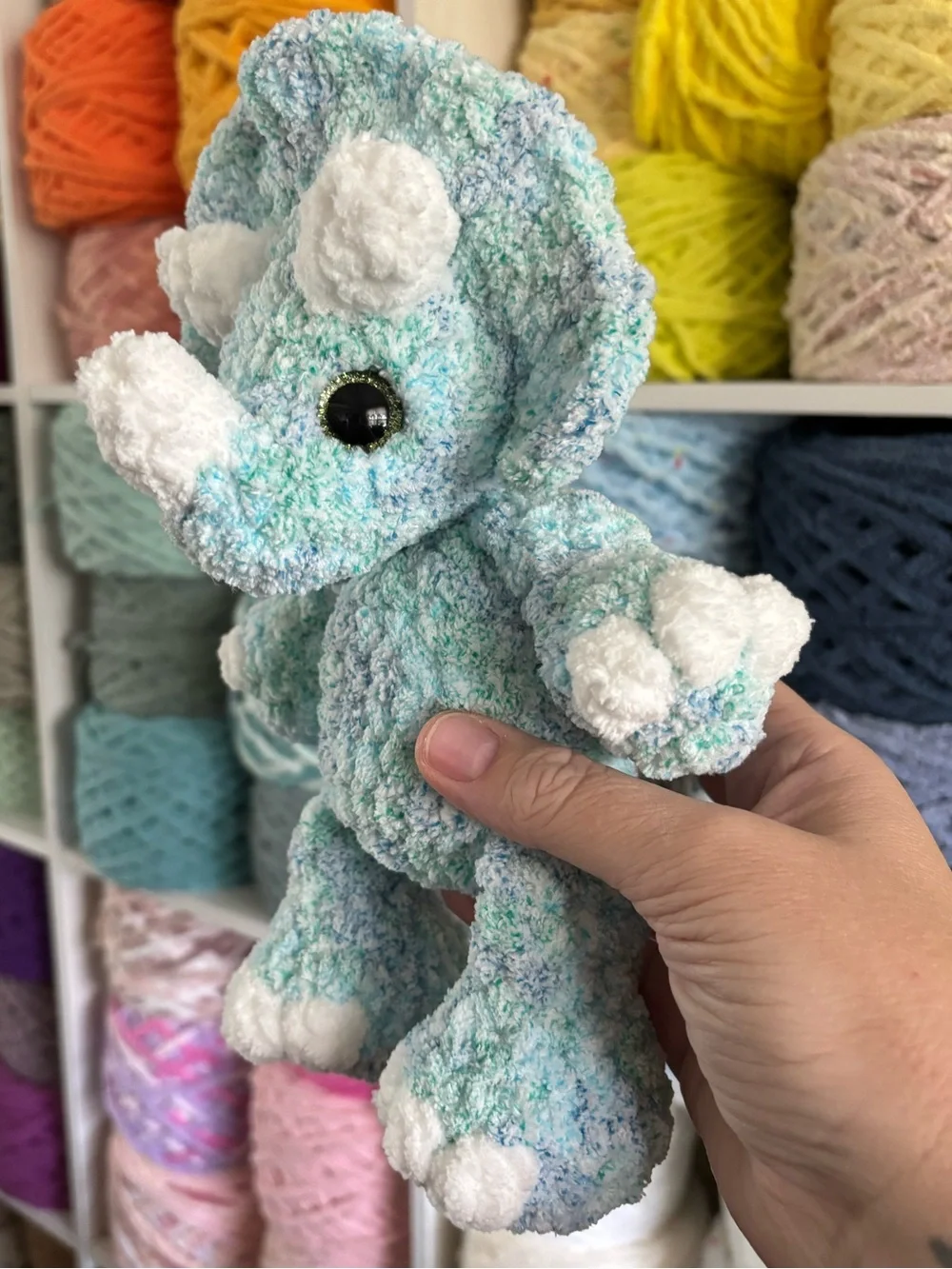 Crochet baby Triceratops plush.
